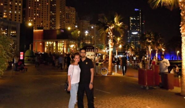 A couple in JBR Dubai in the evening