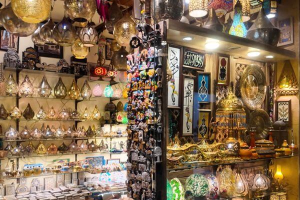 Glasswork in Egypt A souvenir shop in Egypt selling brass lanterns, glass lamps, Arabic calligraphy art and small figurines.