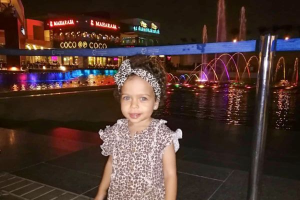 Little girl in front of Cairo Festival City Mall, Egypt