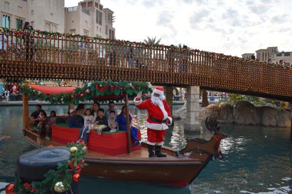 People sailing on Abra with Santa in Madinat Jumeirah Dubai during Christmas