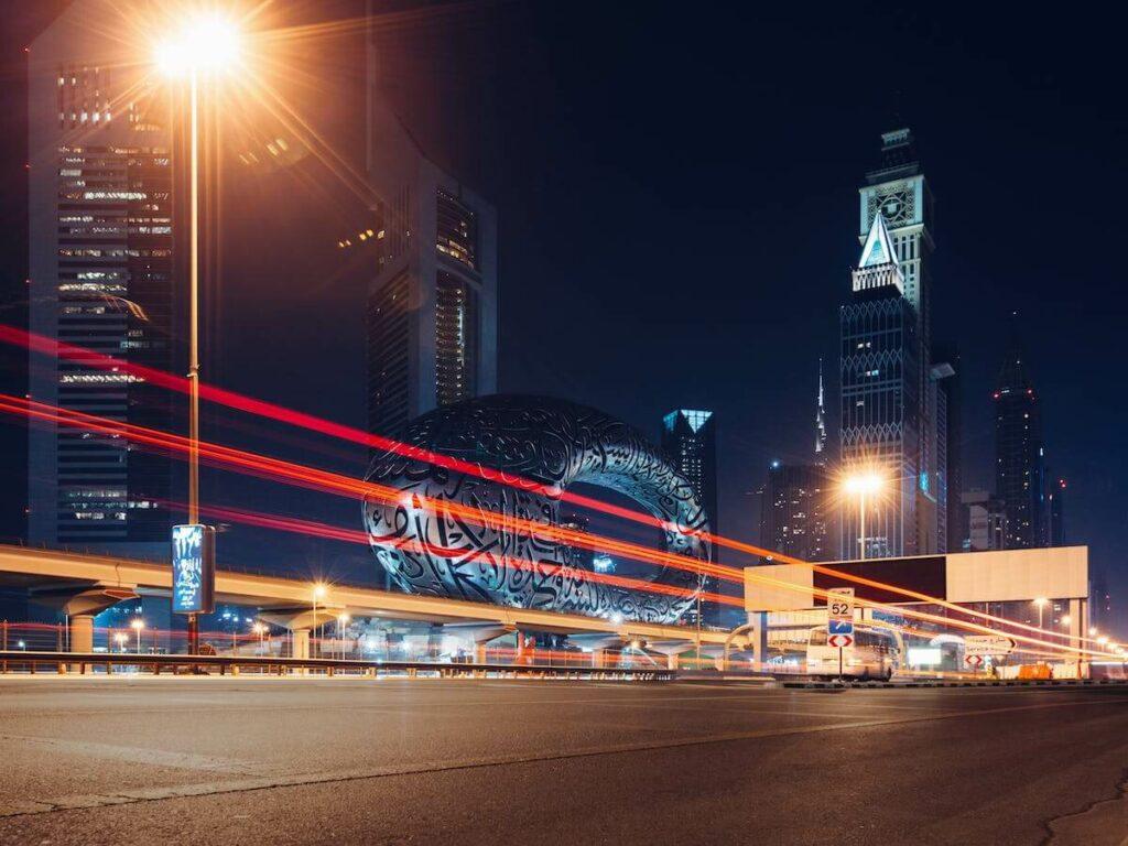Roads of Dubai with Museum of The Future in the background at night