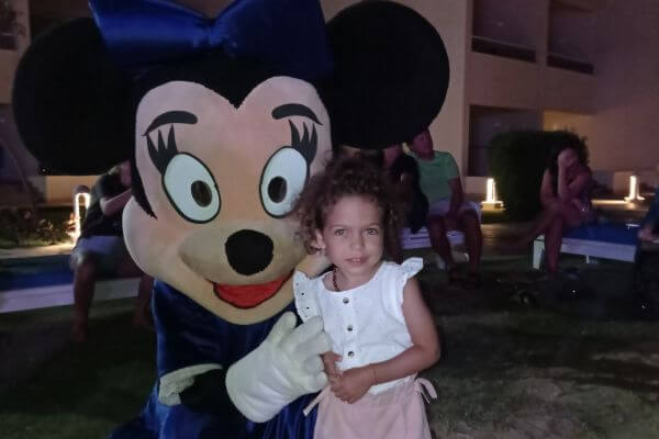 A girl with a Minnie during the animation program in Pickalbatros Dana Beach Resort Hurghada