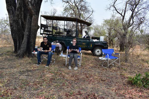 Me and my husband having lunch in Zambezi National Park during the game drive