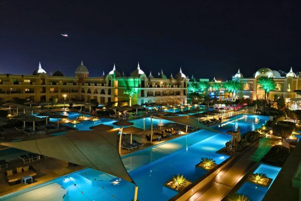 Titanic Royal resort Hurghada The pools and hotel buildings of Titanic Royal Resort in Hurghada, Egypt, lit up at night.